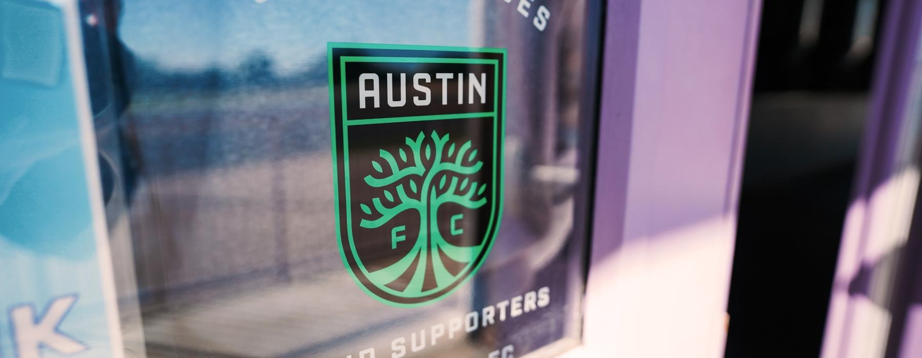 Austin FC sticker on a window